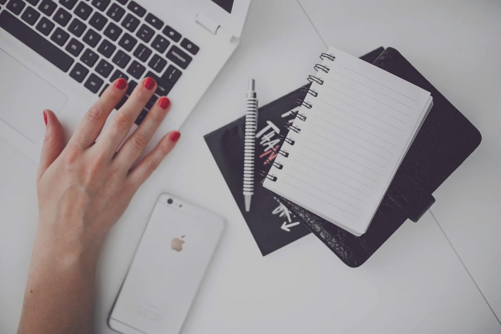 Hand on Laptop